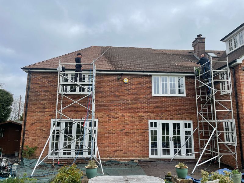 Roof cleaning carried out safely from scaffold towers by The Roof Moss Cleaners in Kidlington